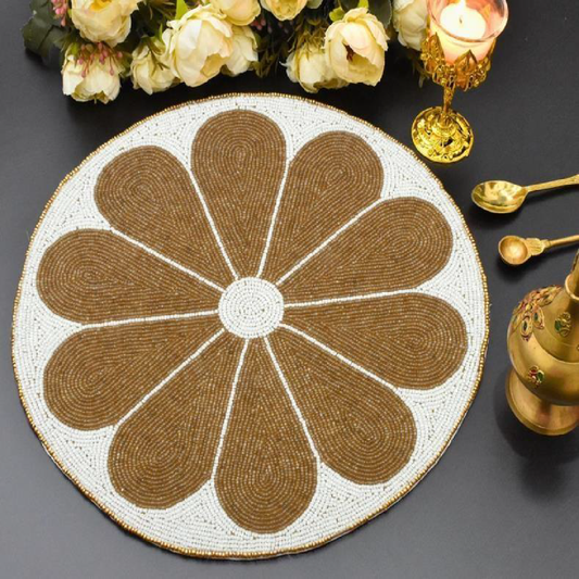 Beaded circular golden flower design placemat