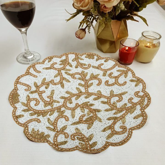 Beaded circular golden silver leaf stem design placemat