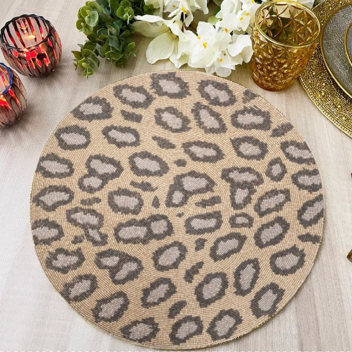 Beaded rounded yellow brown jaguar design placemat